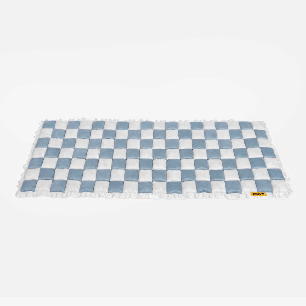 Plaid pattern detail on a pet mat couch cover, highlighting the aesthetic appeal