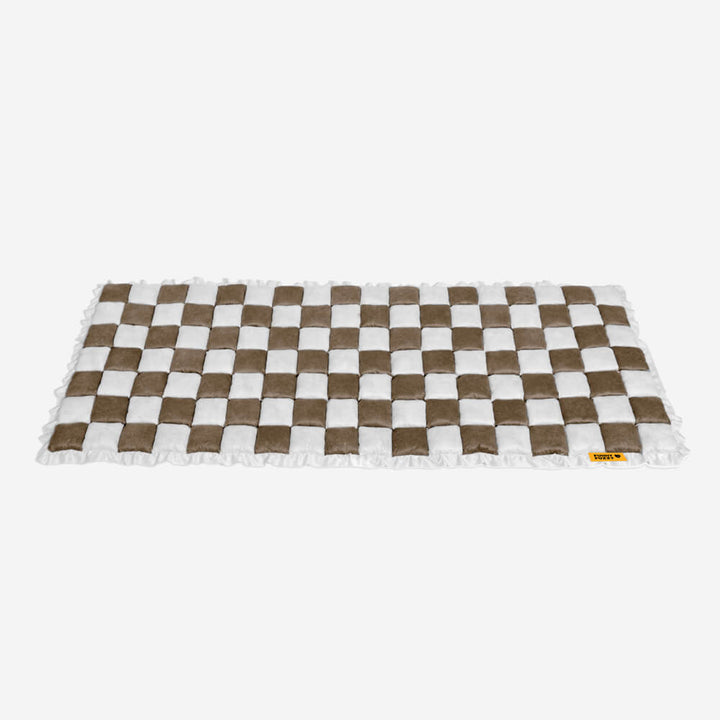Unisex plaid couch cover in a living room setting, blending with home decor