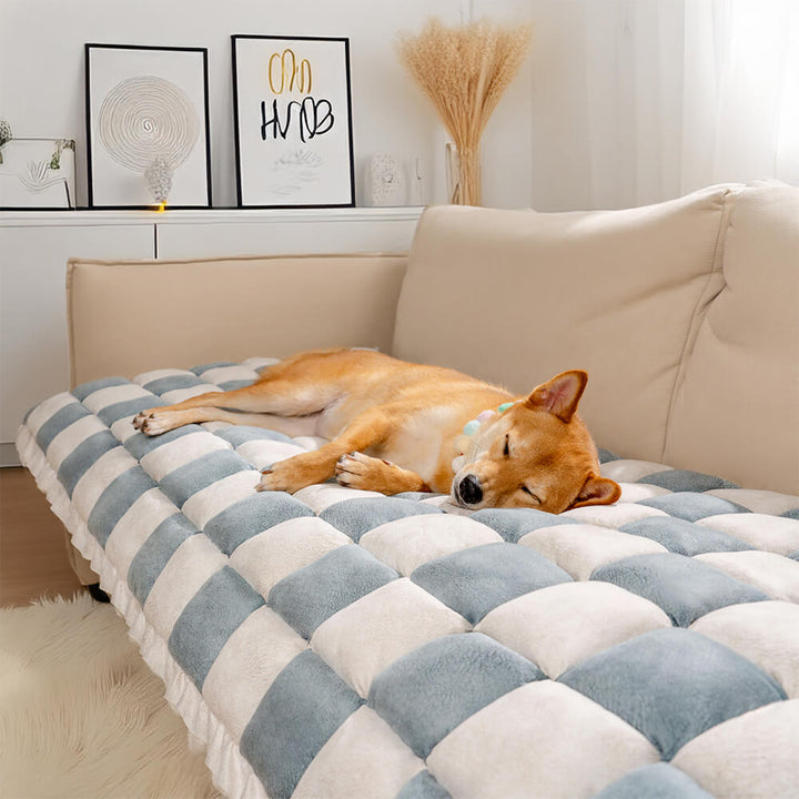 Close-up of plaid fabric on pet mat couch cover, showing texture and quality, home decor