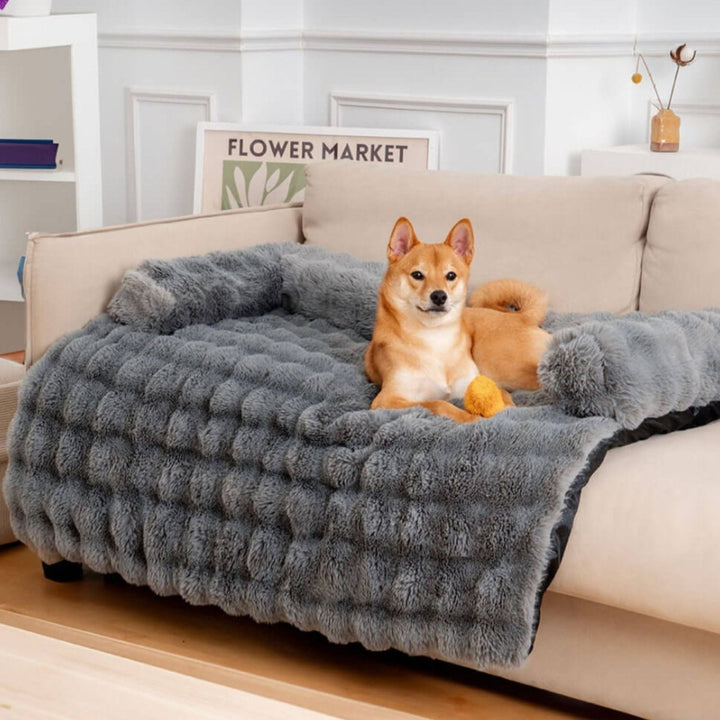 Soft gray plush pet bed with raised edges, non-slip base, dog & cat friendly