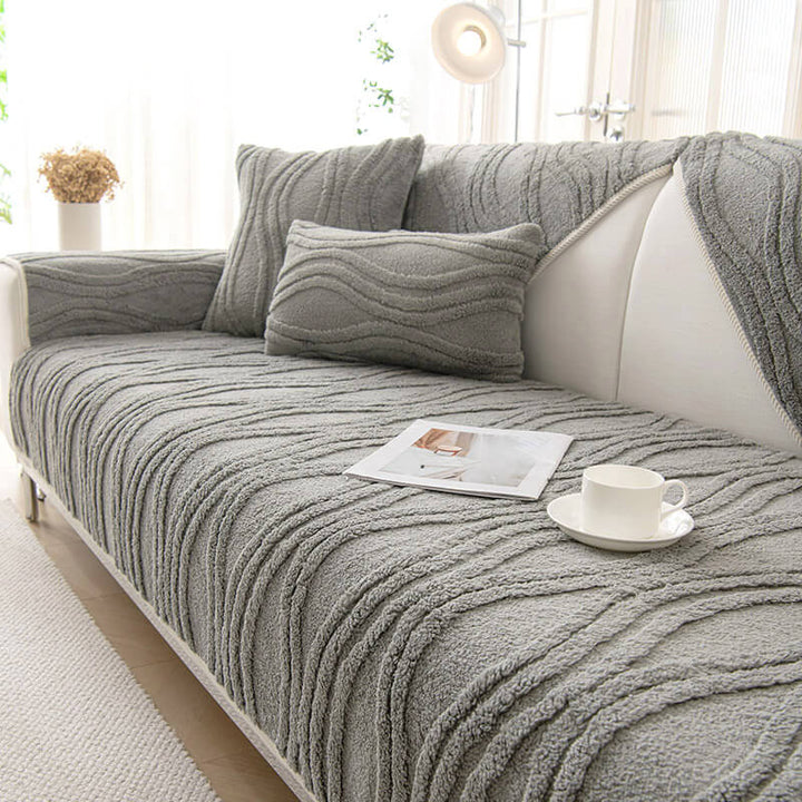 Green plush non-slip sofa slipcover, machine washable, ideal for sectional couches.