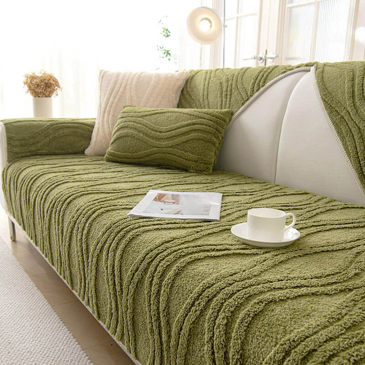 Pet friendly green sofa slipcover, plush and non-slip, protecting your furniture.
