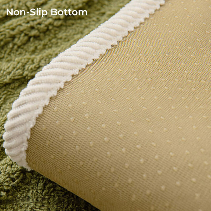 Machine washable green couch cover, plush and non-slip, enhancing your home decor.