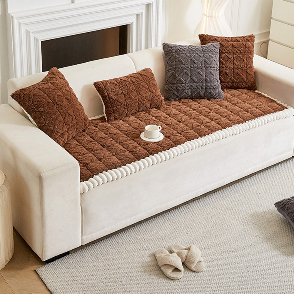 Durable anti-slip plaid sofa protector, plush and machine washable, ideal for active homes.