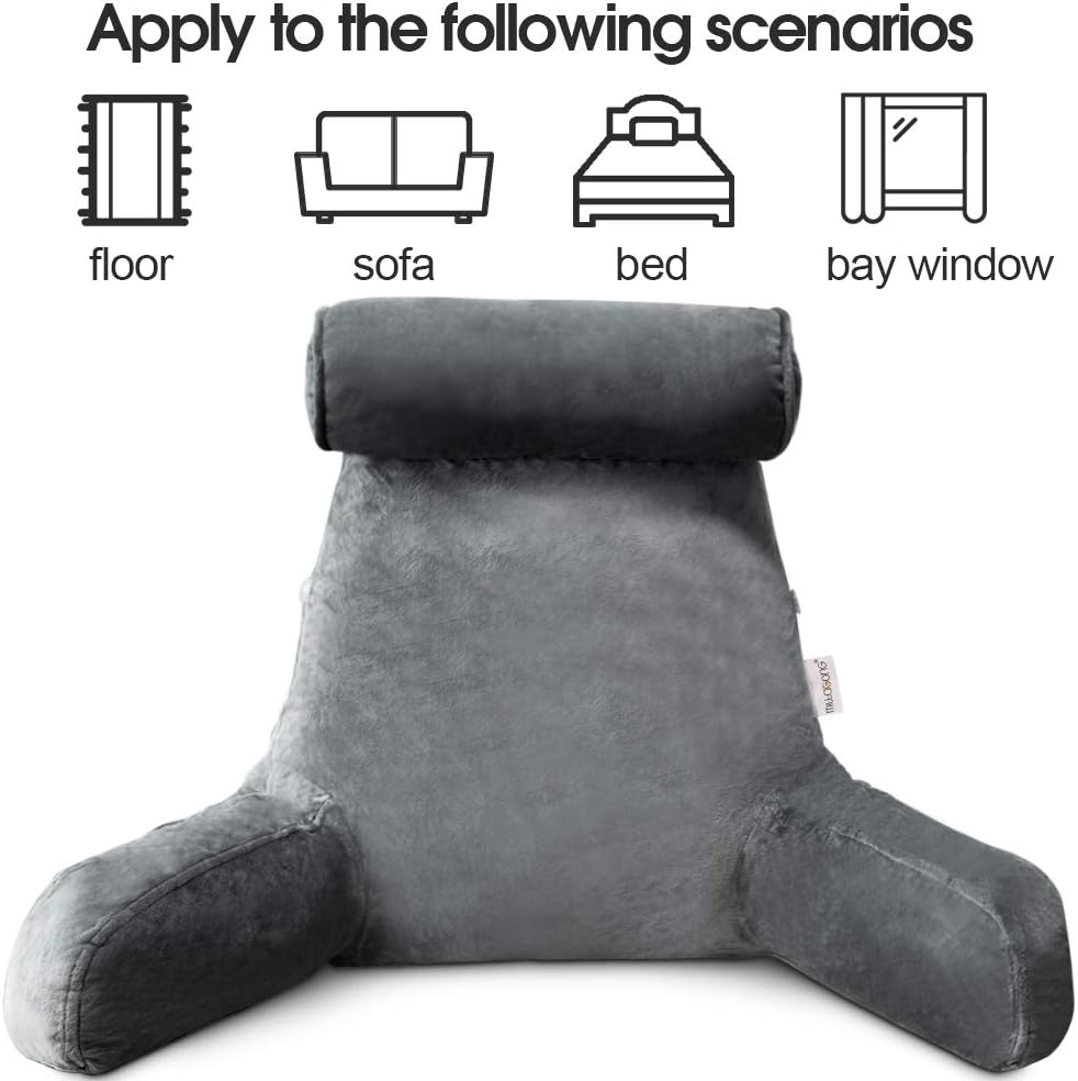 Cozy lounge pillow with arms, ideal for reading in bed or relaxing at home.