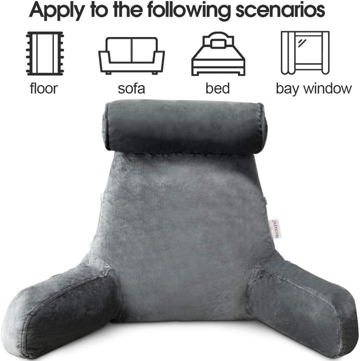 Cozy lounge pillow with arms, ideal for reading in bed or relaxing at home.