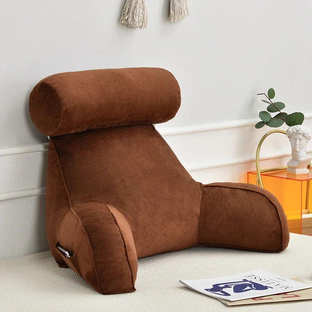 Ergonomic unisex reading bed pillow featuring supportive arms and a comfy backrest.