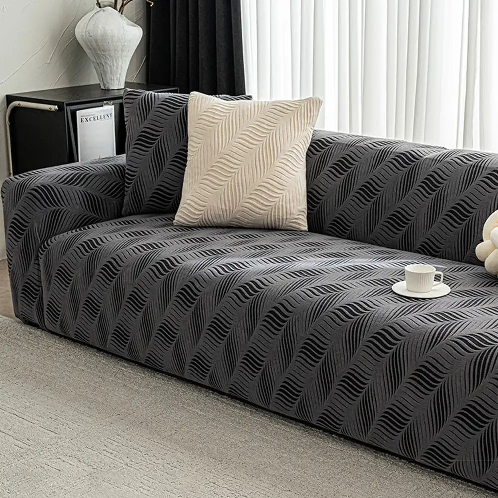 Cozy polar fleece sofa slipcover, featuring jacquard weave, elastic and pet-friendly furniture protection