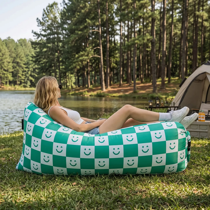 Unisex portable inflatable air sofa for outdoor lounging, perfect for camping, beach, or festivals. Lightweight & comfy.