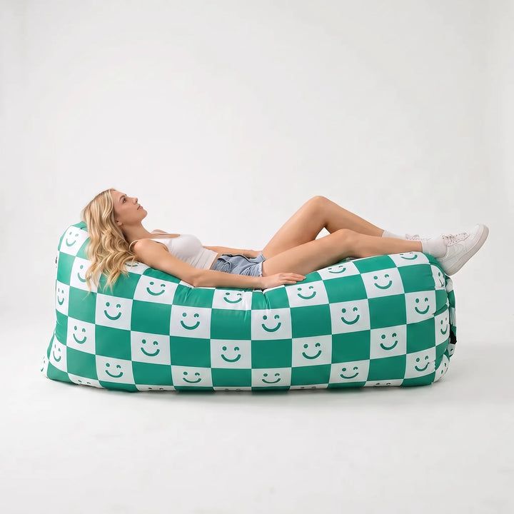 Easy setup inflatable air sofa for outdoor lounging. Portable, no pump needed, ideal for park, beach & garden seating.