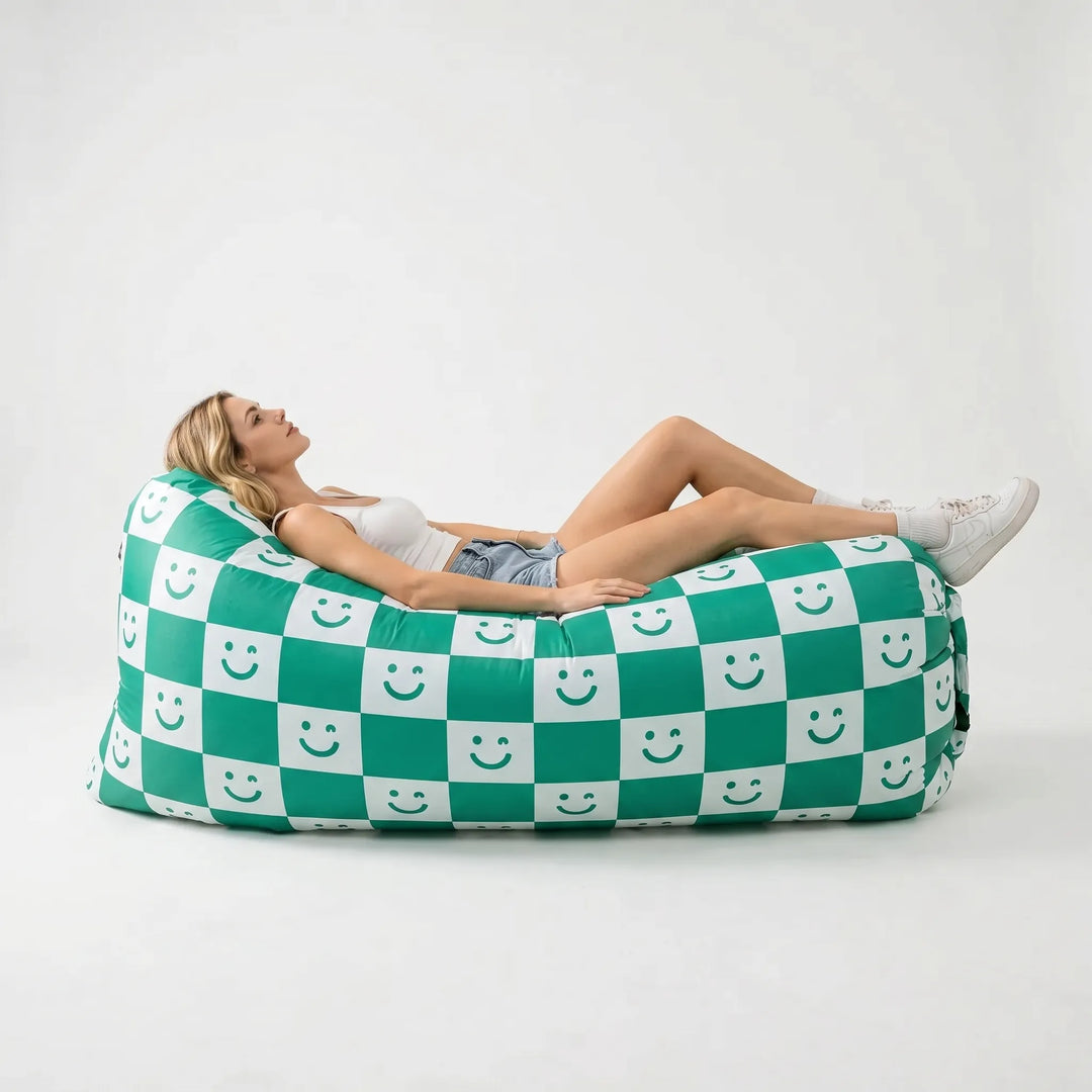 Comfy inflatable outdoor sofa, great camping gear & festival seating. Portable air lounge for park and garden relaxation.