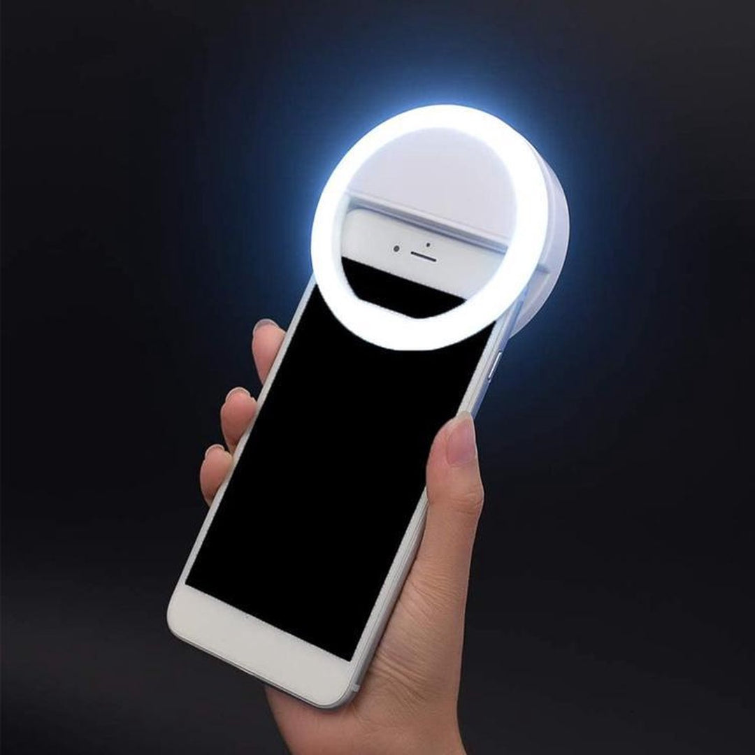 Unisex portable LED selfie ring light for phones & laptops. Ideal for vlogging, content creation, & video calls.