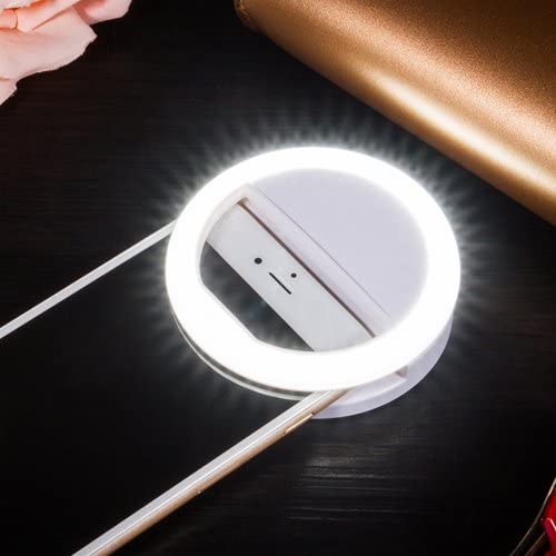 Enhance video calls & photos with this portable LED selfie ring light for phones & laptops; easy to clip on.