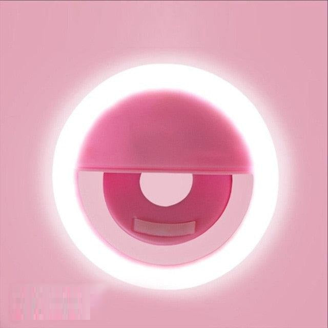 Versatile LED ring light for phones, laptops, and webcams. Essential for content creators & influencers.
