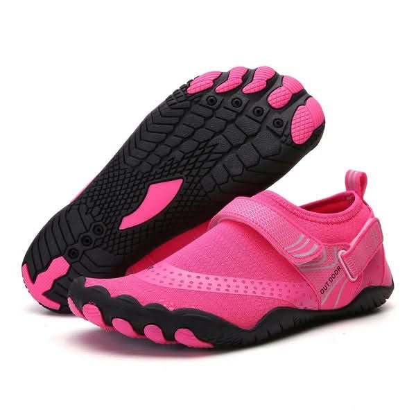 Stylish black quick-dry water shoes, offering grip for pool decks, beaches & water sports. Comfortable unisex design.