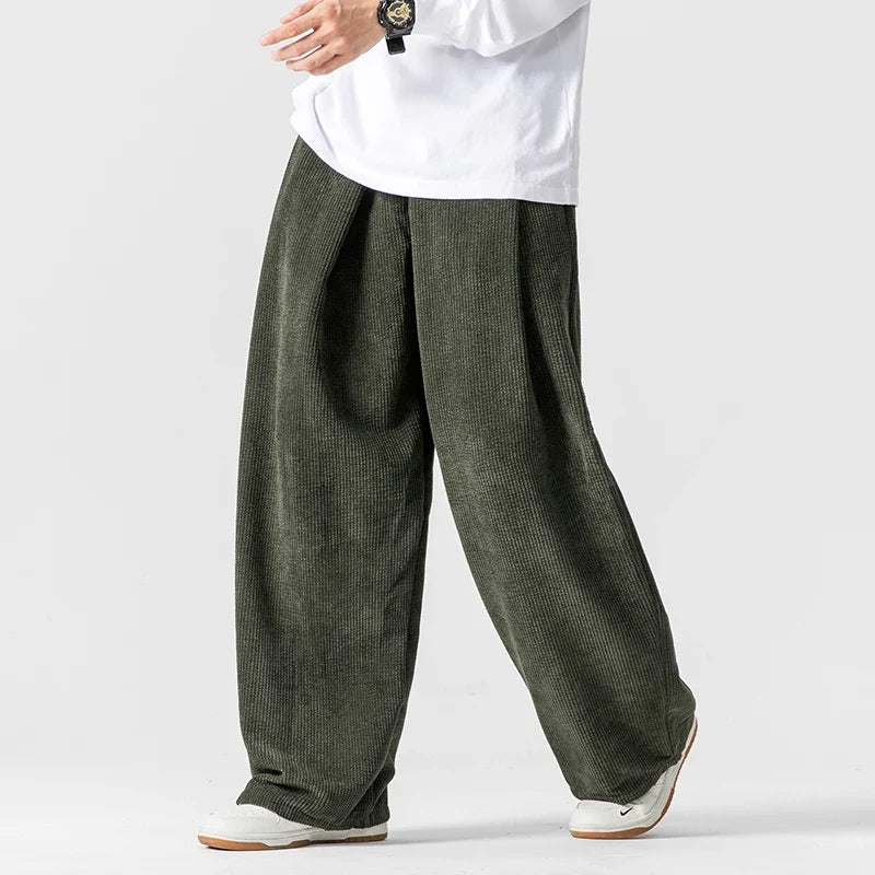 Unisex relaxed fit wide-leg drawstring pants for ultimate comfort & casual streetwear style.