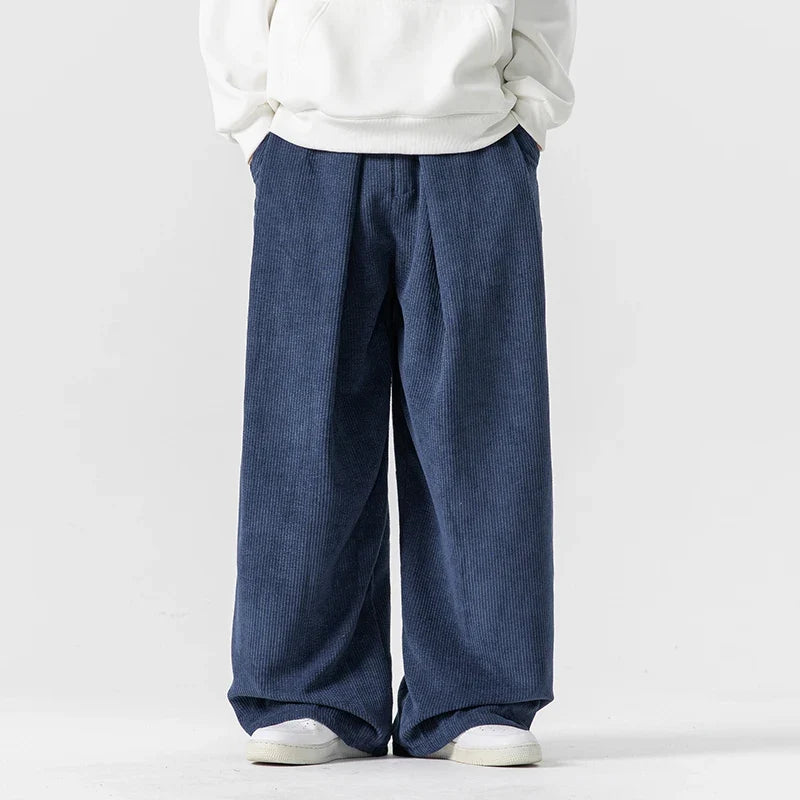 Modern black wide-leg drawstring pants, unisex relaxed fit for a comfortable, versatile look.