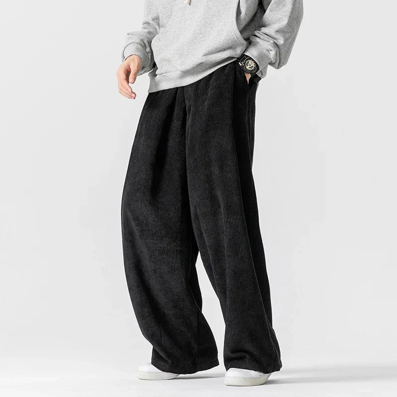 Navy blue unisex wide-leg pants with drawstring, perfect for relaxed comfort & modern streetwear.
