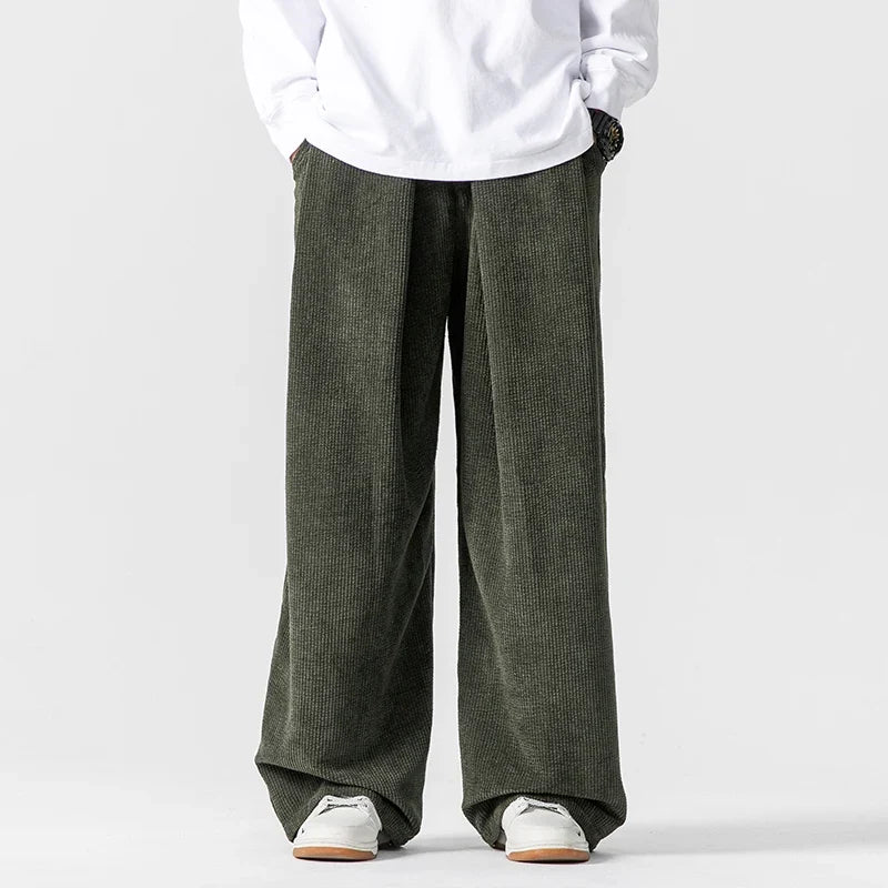Casual gray wide-leg drawstring pants, offering a relaxed fit for all-day unisex comfort.
