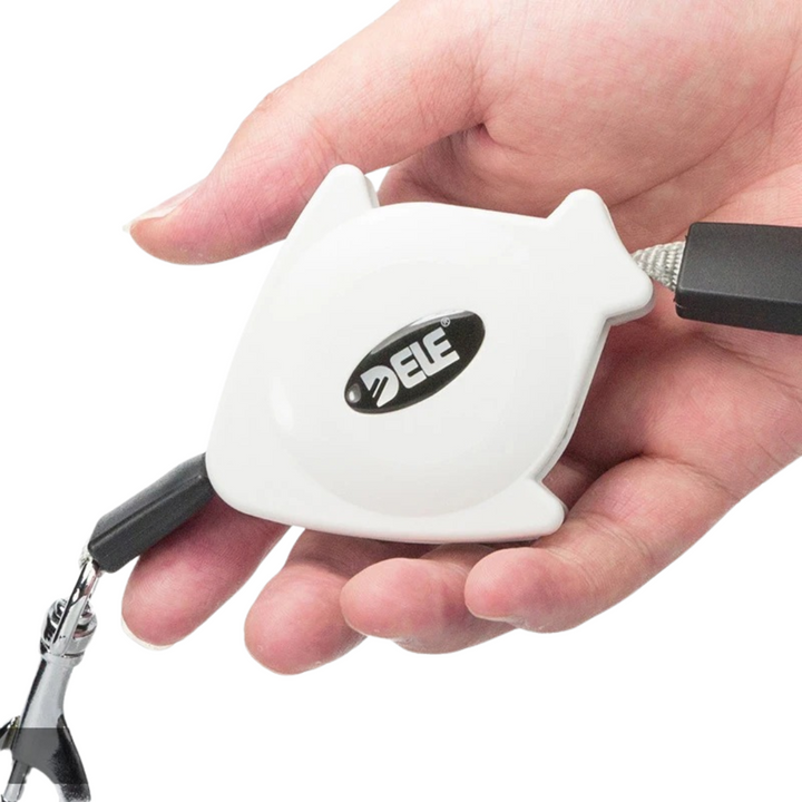 Unisex pet retractable leash with ergonomic handle, durable nylon for pets weighing up to 66 lbs.