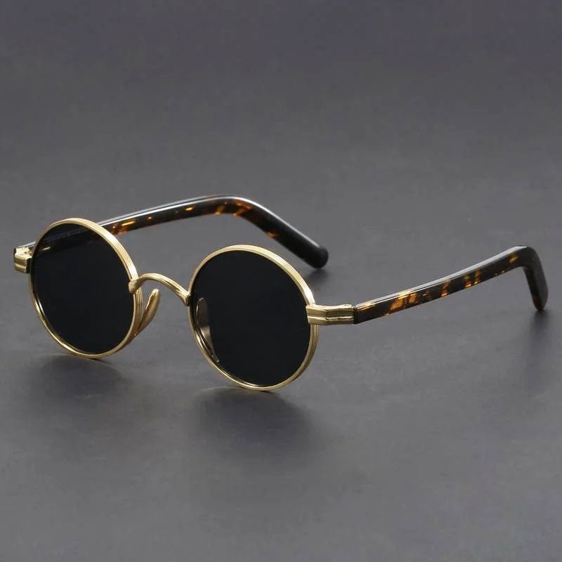 Unisex retro round metal sunglasses. Vintage eyewear with UV400 protection, perfect fashion accessory.