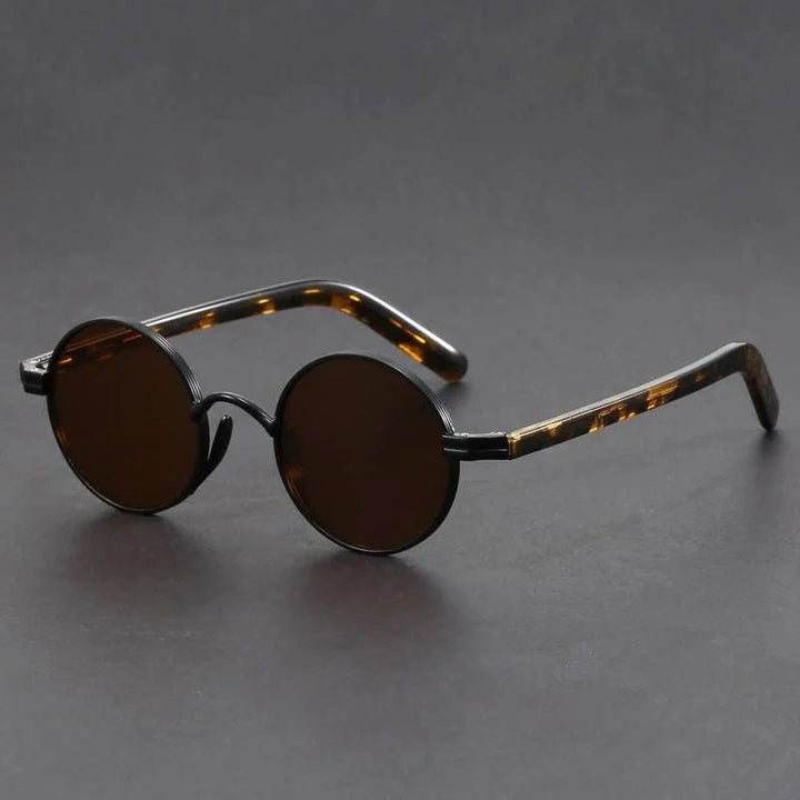 Classic round frame sunglasses for men & women. Durable metal frame & UV400 lenses offer premium eye protection.