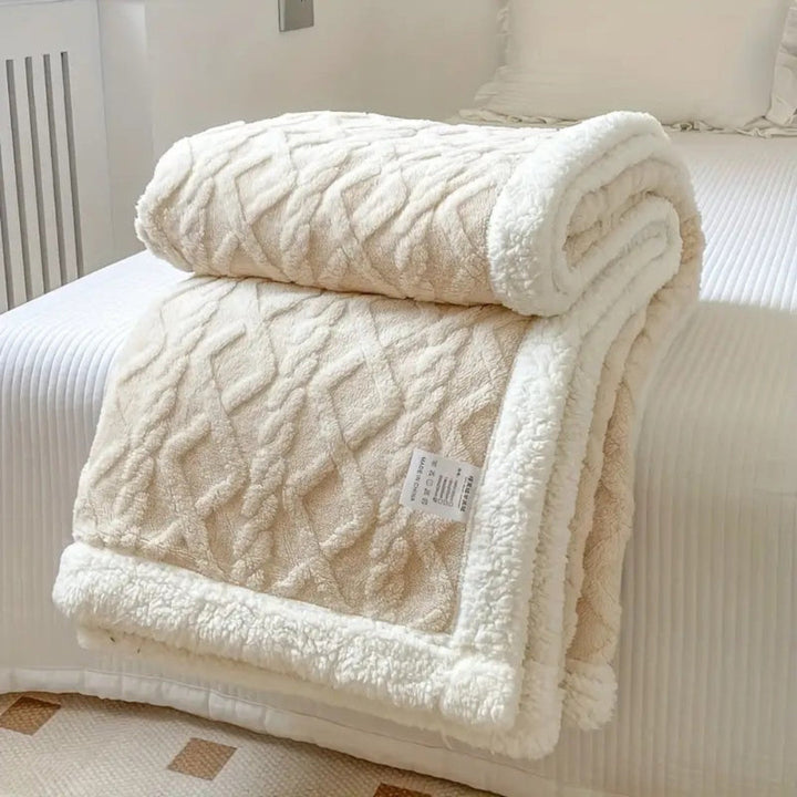 Machine washable sherpa fleece pet blanket, providing ultimate comfort for dogs and cats.