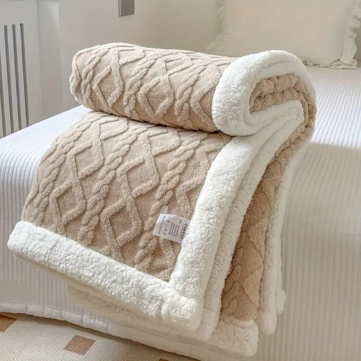 Light gray reversible sherpa throw blanket, versatile for living room sofas or bedroom accents.