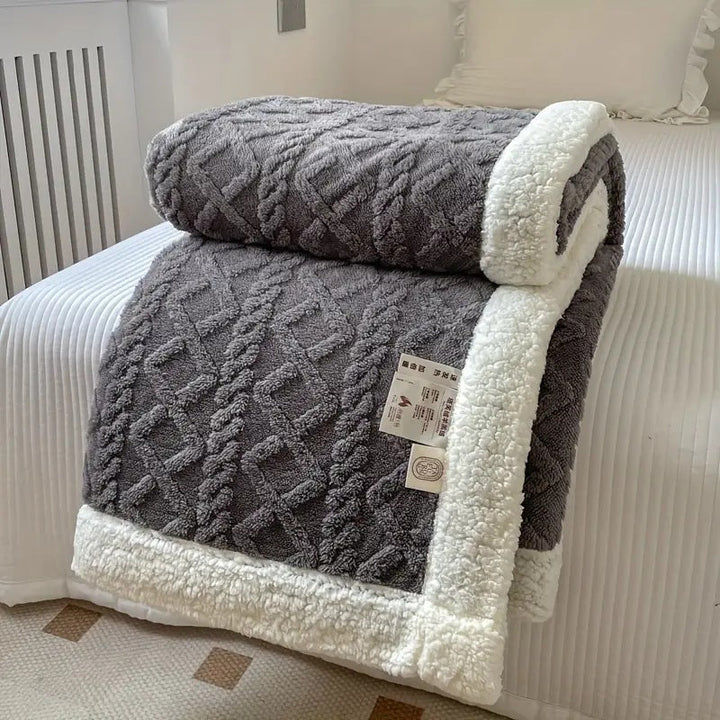 Cozy and stylish reversible blanket, a perfect winter warmer gift for pet owners or home lovers.