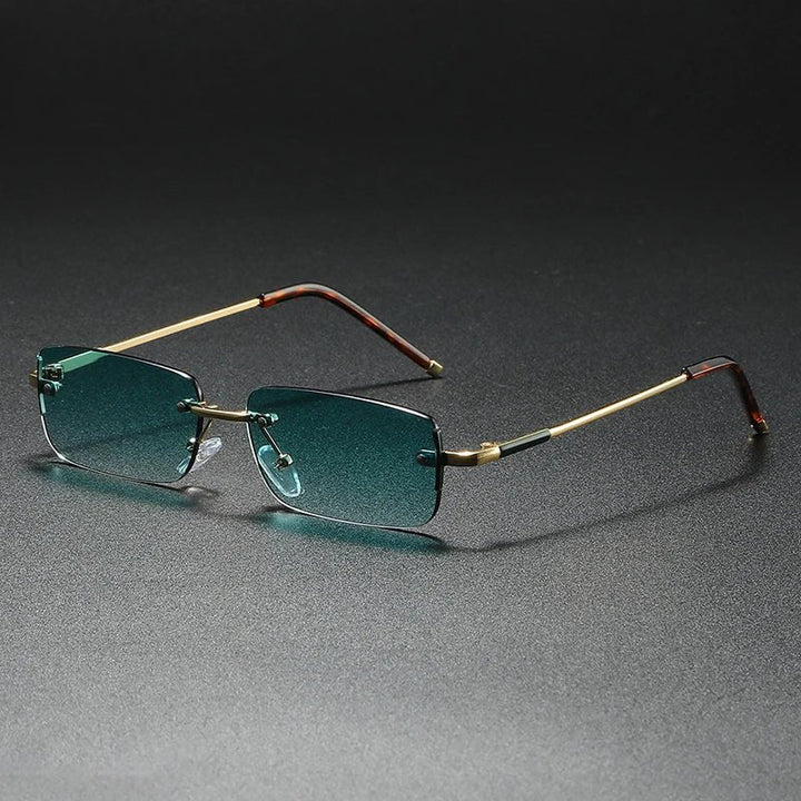 Unisex rimless rectangular sunglasses with gradient lenses and stylish gold accents.