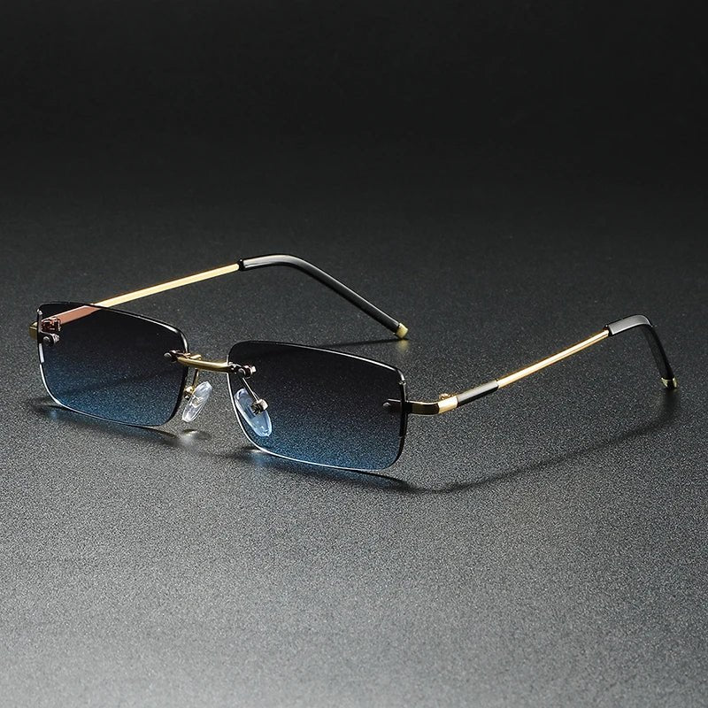 Rimless rectangular gradient sunglasses for men & women, detailed with sleek gold accents.