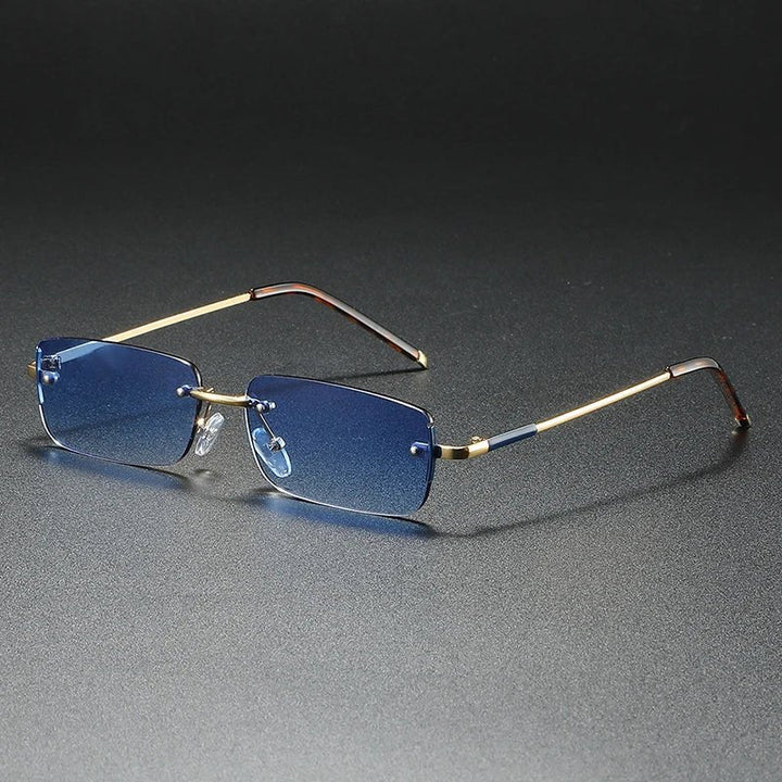 Contemporary rimless rectangular gradient sunglasses with gold accents for a chic, modern look.
