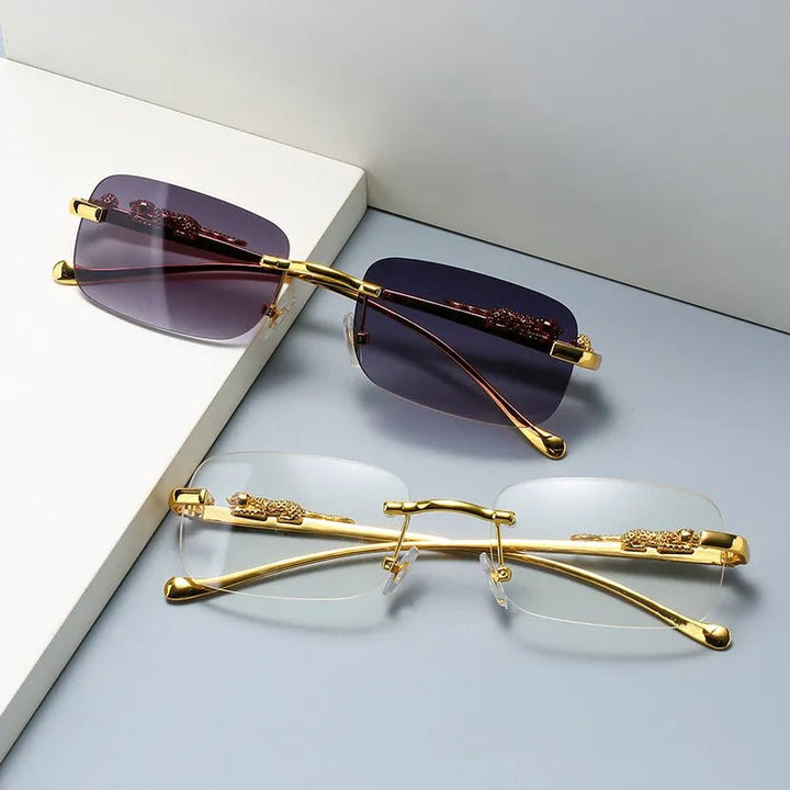 Modern rimless unisex sunglasses, UV400 anti-reflective lenses, perfect for summer fashion.