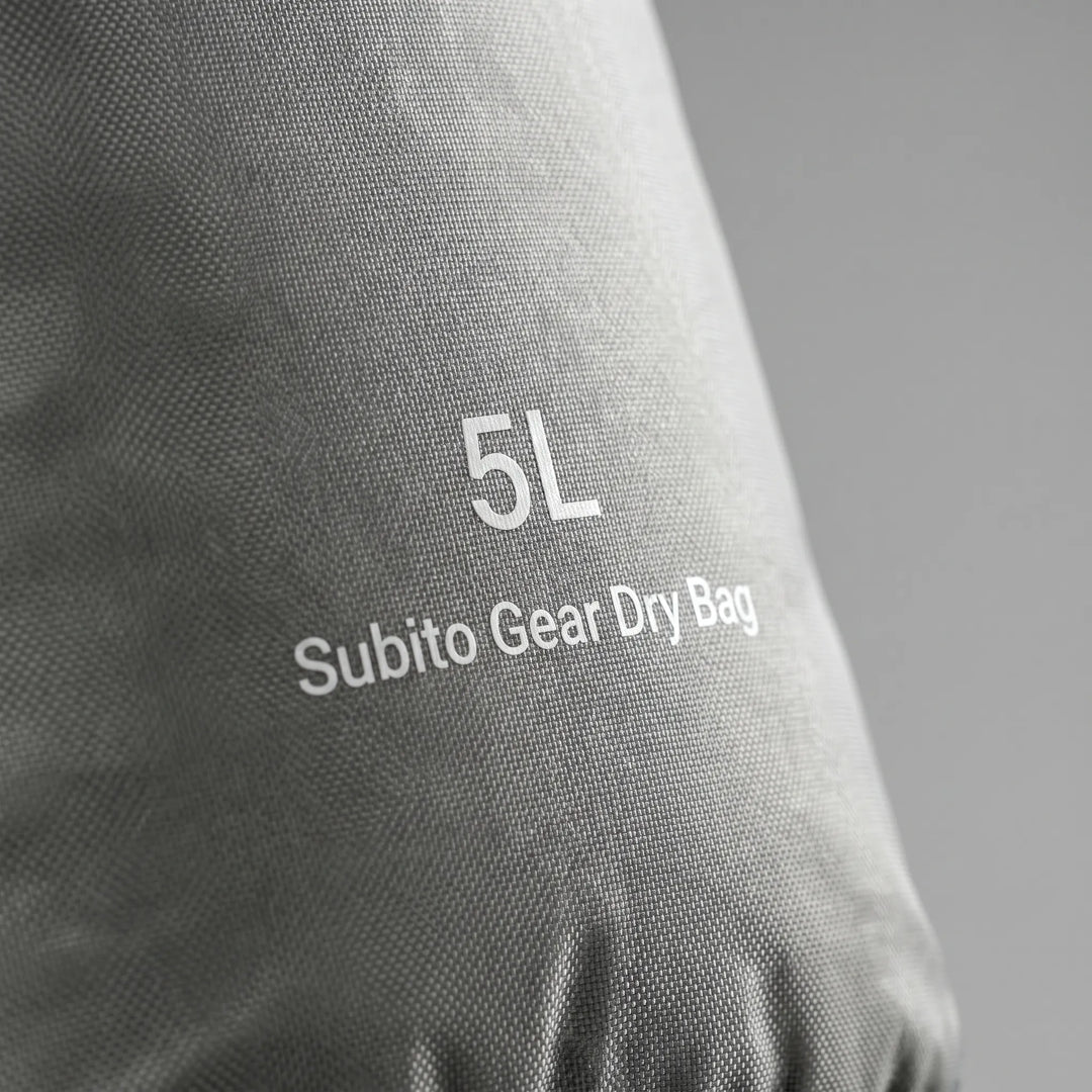Durable roll-top dry bag, essential waterproof storage sack for all your outdoor adventures.