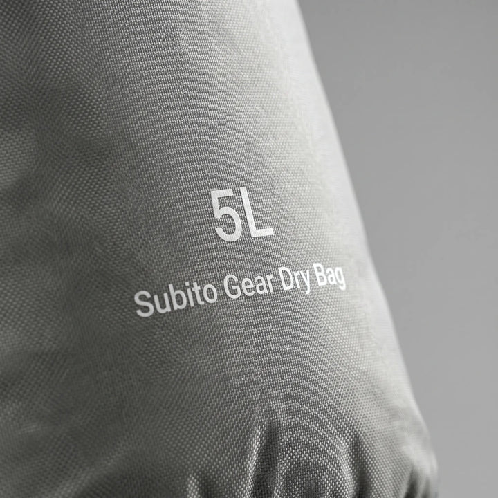 Durable roll-top dry bag, essential waterproof storage sack for all your outdoor adventures.