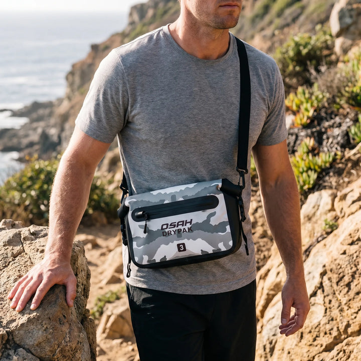 Unisex roll-top waterproof waist bag for outdoor adventures. Keeps essentials dry during hiking & cycling.