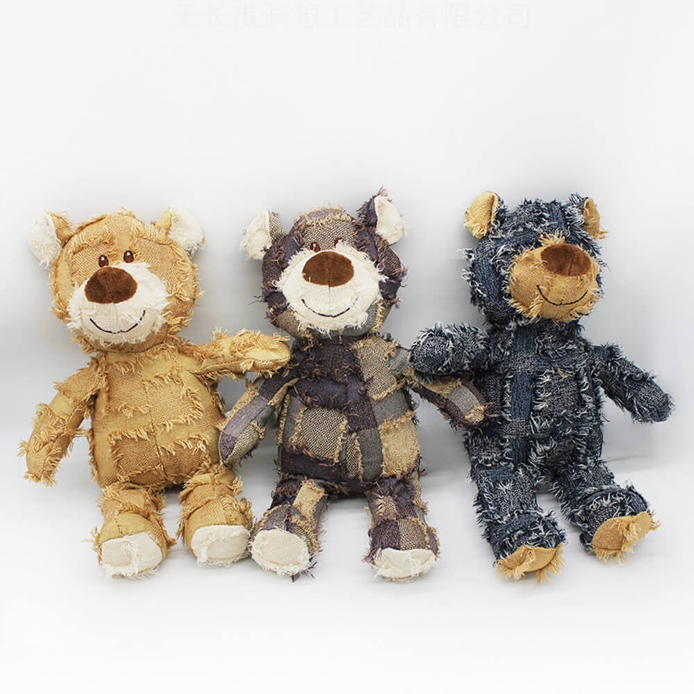 Unisex rustic denim plush bear dog chew toy with squeaker, durable for dental health & playtime.