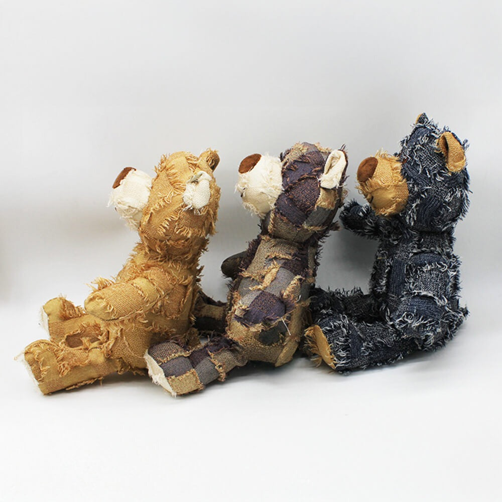 Cute plush bear dog toy, made from rustic denim, perfect pet accessory for active chewers.