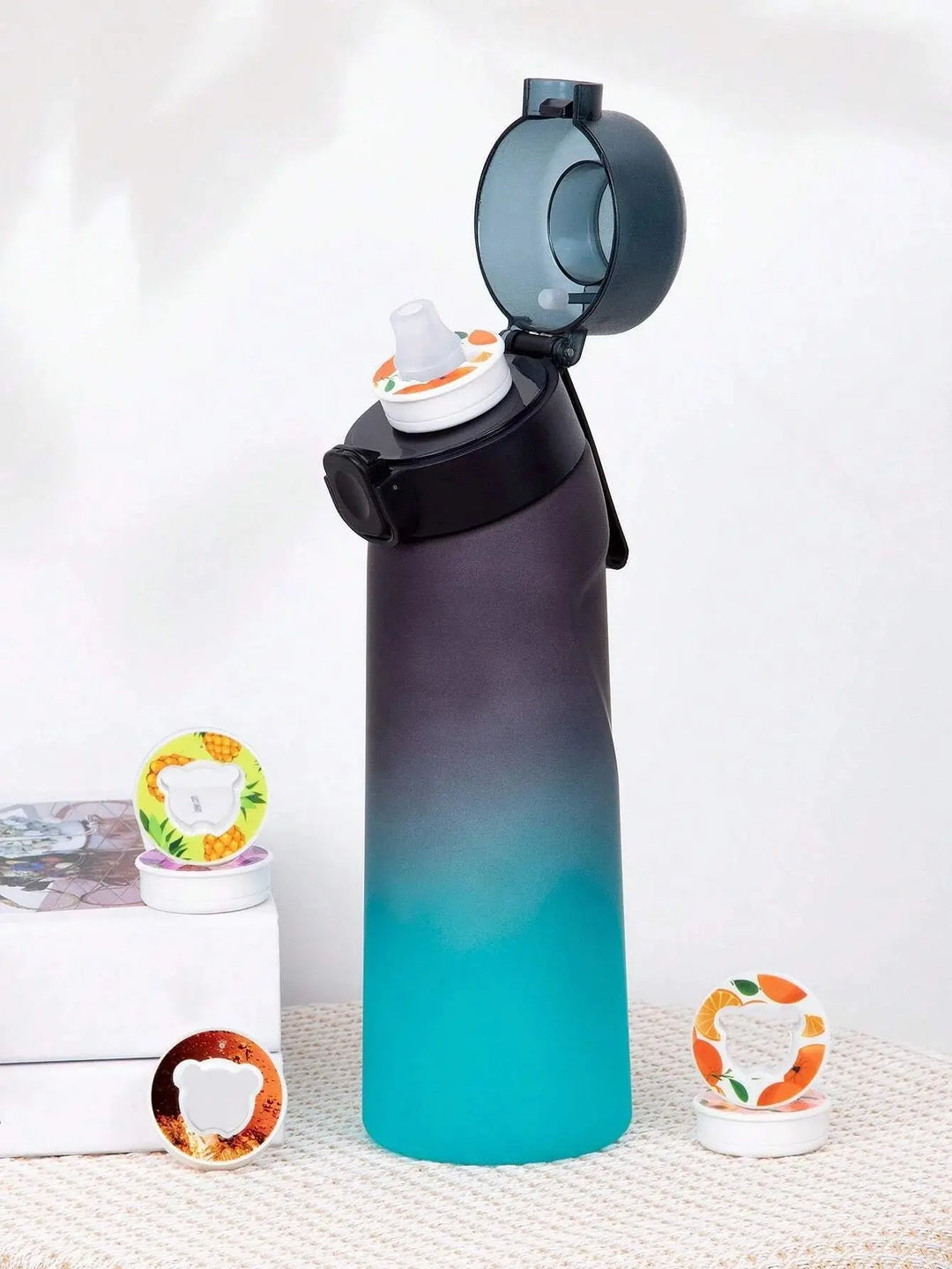 Eco-friendly reusable drink bottle, 0.65L, offers sugar-free healthy flavored water.