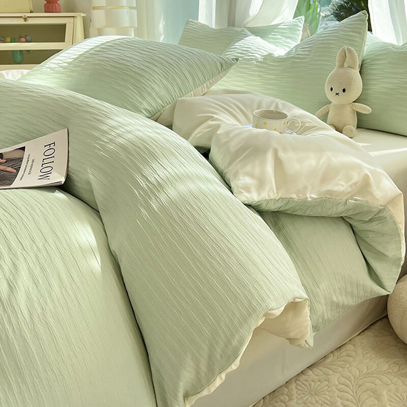 Unisex seersucker solid color bedding set in a light blue shade, perfect for all-season comfort.