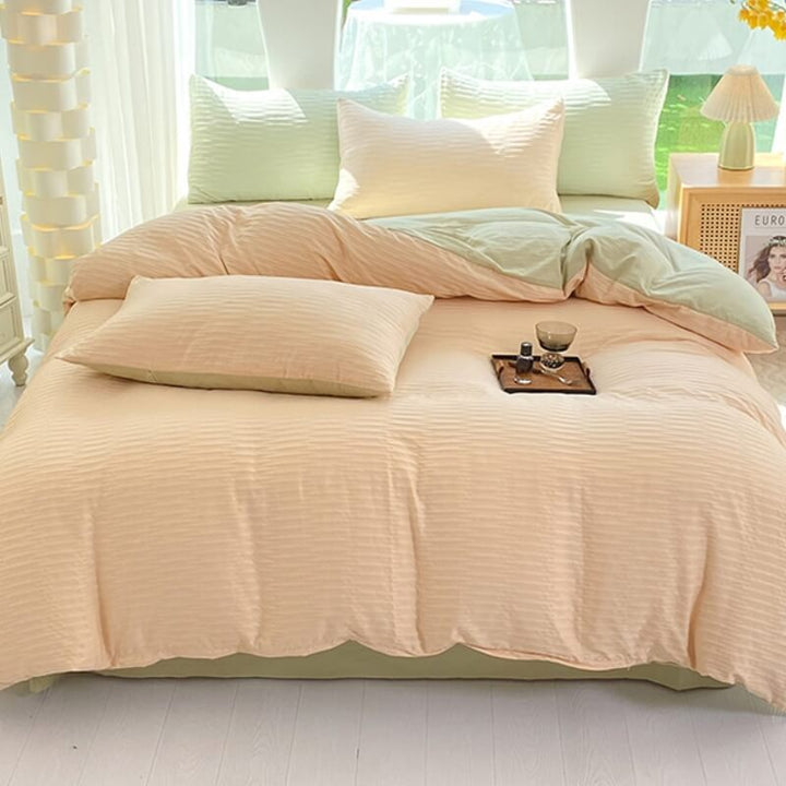 Wrinkle-resistant polyester seersucker bedding set in a warm cream solid color, perfect for cozy comfort.