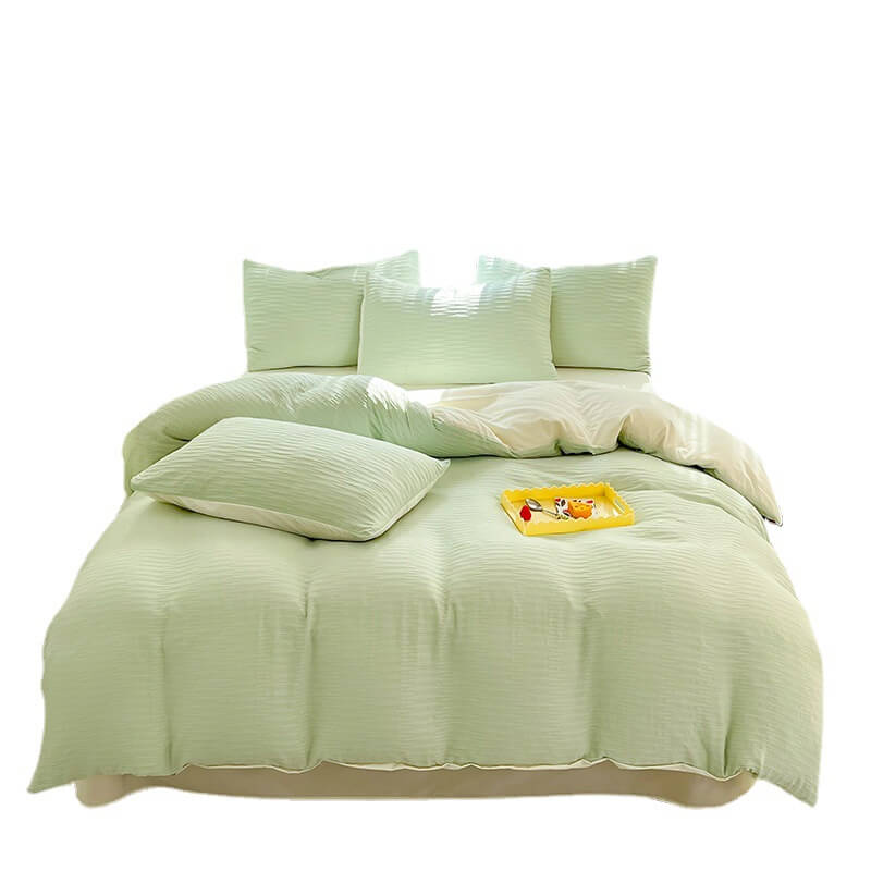 Modern bedroom featuring a solid color seersucker bedding set, showcasing its stylish and comfortable appeal.