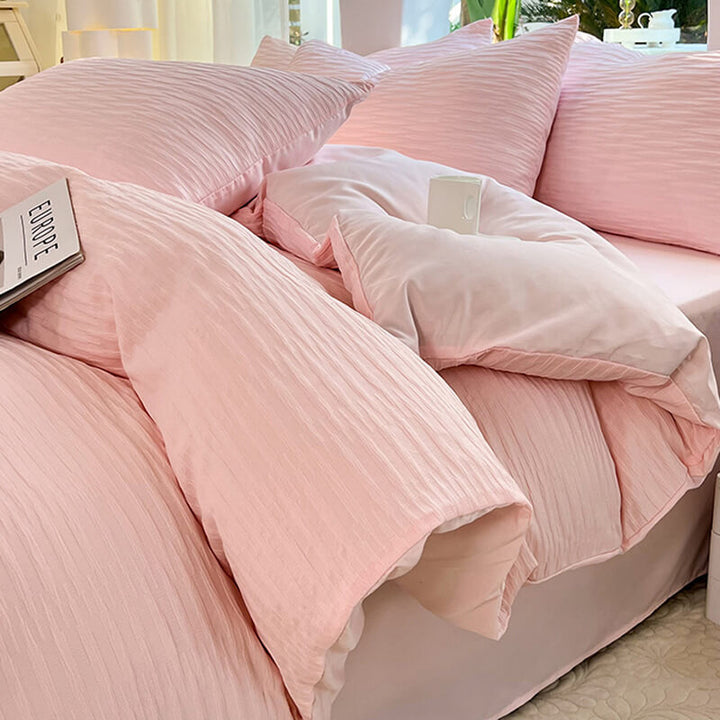 Detail shot of the textured seersucker fabric on an all-season solid color bedding set.
