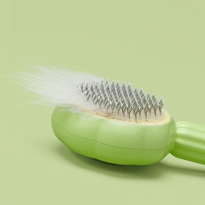 Close-up of a self-cleaning pet brush, showing bristles for effective shedding & care