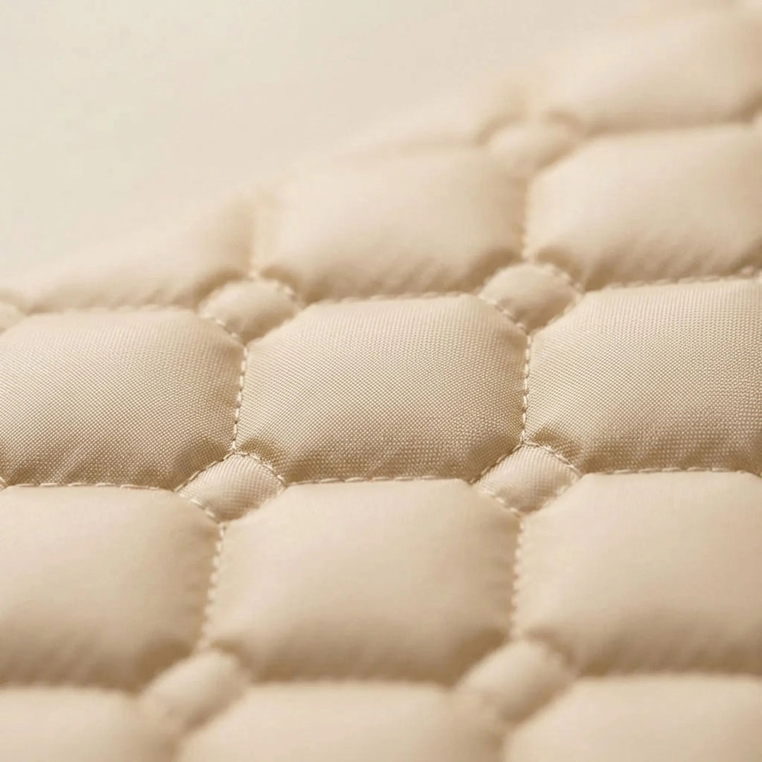 Durable cream self-inflating foam sleeping pad for camping & hiking. Essential outdoor gear providing superior sleep comfort.