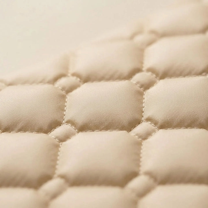 Durable cream self-inflating foam sleeping pad for camping & hiking. Essential outdoor gear providing superior sleep comfort.