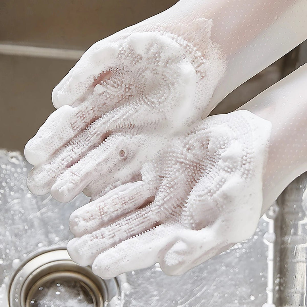 Hands wearing silicone pet grooming gloves, demonstrating deshedding on a pet's fur.