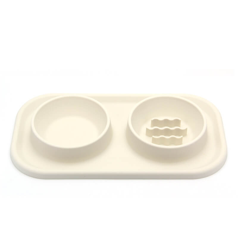Double pet bowl in grey silicone, featuring a slow feeder design for dogs and cats, non-slip base.