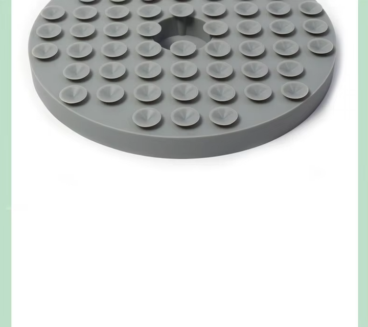 Pink slow feeder silicone mat for dogs, helps prevent indigestion & makes mealtime last longer.