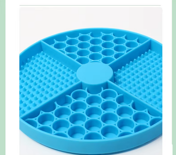 Multi-colored slow feeder dog mat, made of food-grade silicone, essential pet feeding bowl.